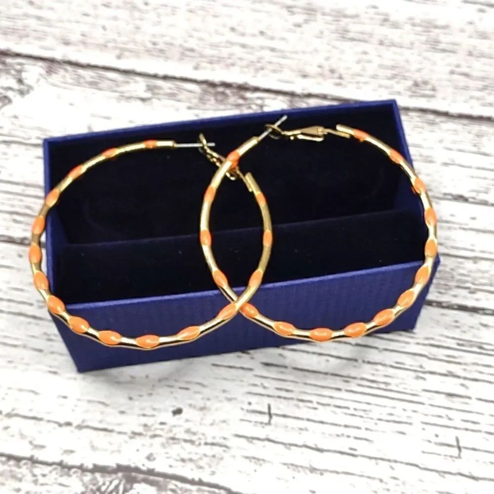 Large Coral Hoops.  B1